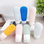 Bouteille de voyage portable de 60 ml à ventouse en silicone avec brosse, bleue, verte, rose
