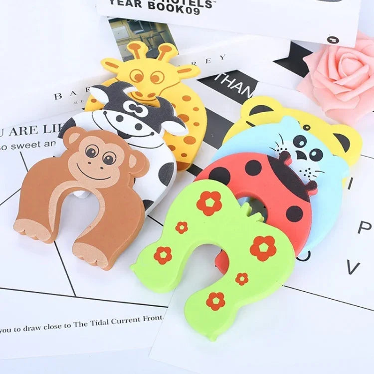 Butées de porte sécurisées pour bébé, protège-doigts, verrou de sécurité, jouet de protection des doigts pour bébé, livraison couleur aléatoire
