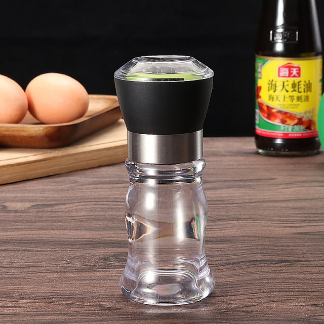 Réservoir d'assaisonnement multifonctionnel Gadget de cuisine Broyeur à poivre manuel créatif