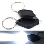 2 lampes de poche porte-clés mini de poche micro LED à presser, lampe de secours ultra lumineuse pour le camping en extérieur, lampe torche.