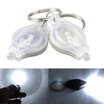 2 lampes de poche porte-clés mini de poche micro LED à presser, lampe de secours ultra lumineuse pour le camping en extérieur, lampe torche.