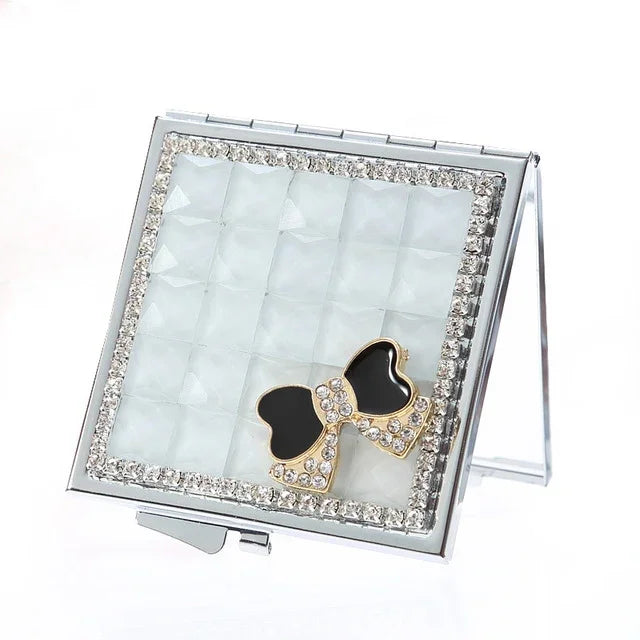 Miroir cosmétique mini pliant fait main Diamant Miroir portable Nœud de pierres précieuses double face